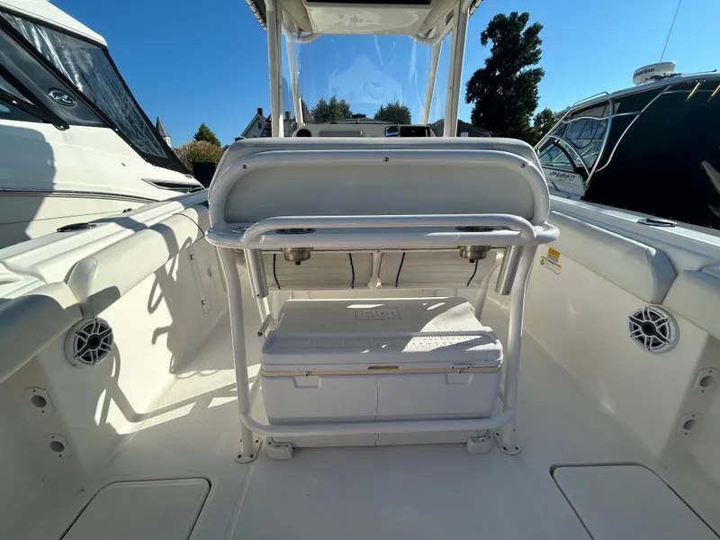Slide: The Image of 2015 Wellcraft 252 Fisherman boat interior with seating and storage. - 15