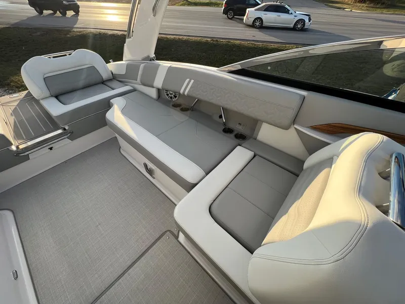 Slide: The Image of Luxurious seating area on 2025 Regal LS9 boat, featuring modern design and comfort. - 8
