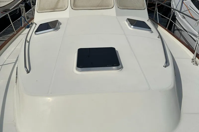 Slide: The Image of 2005 Legacy 42 yacht deck with hatches and railings. - 4