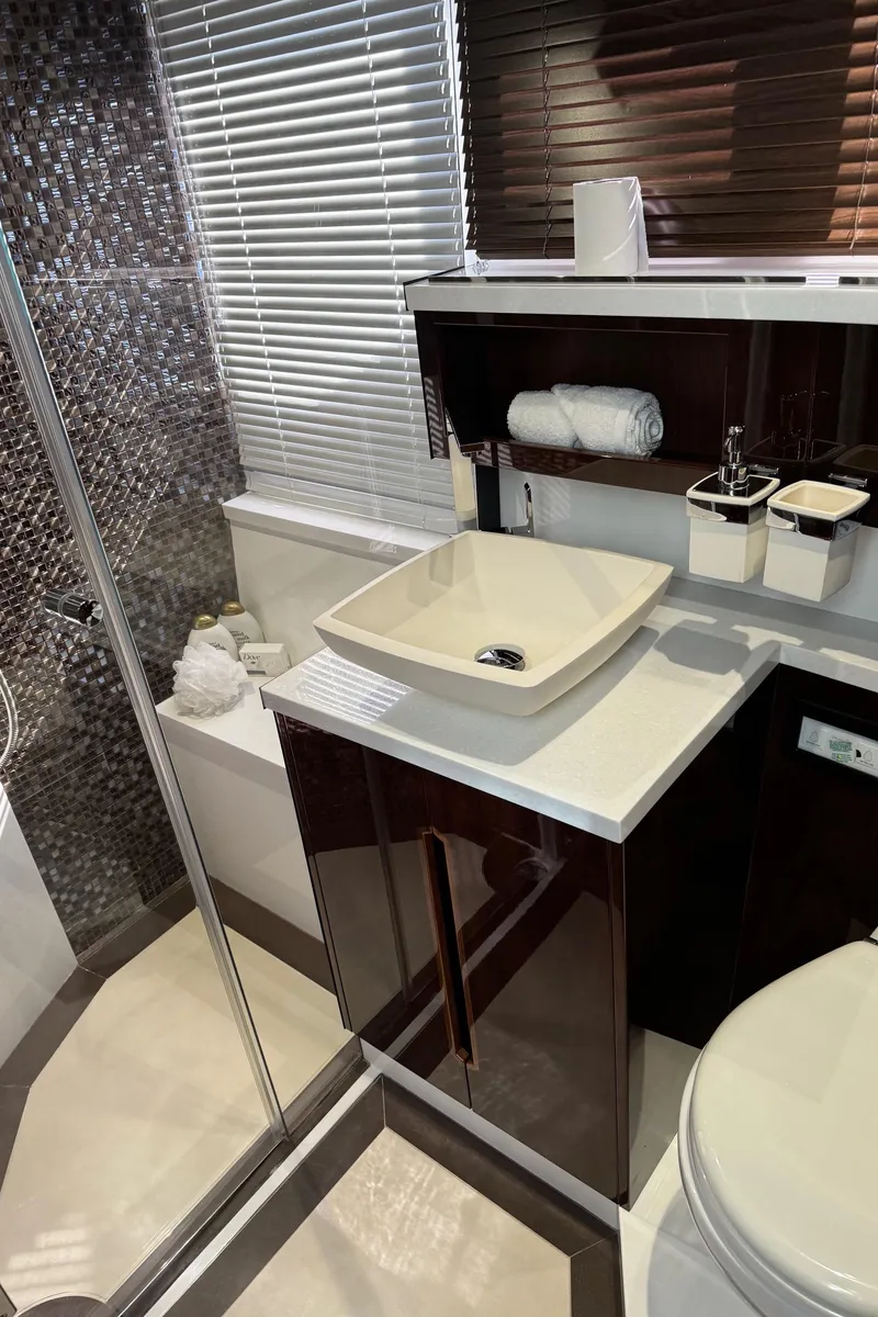 Slide: The Image of Luxurious bathroom in 2019 Galeon 500 Fly yacht with modern sink and shower. - 27