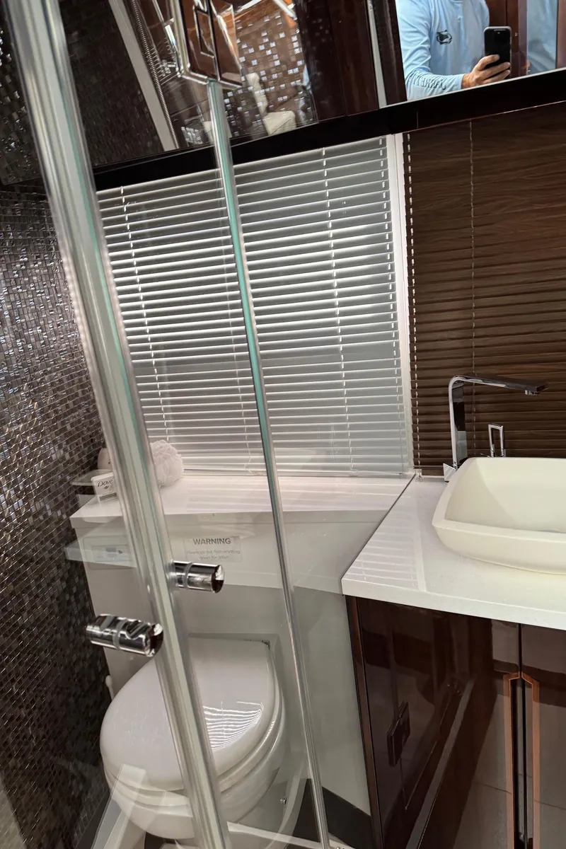 Slide: The Image of Luxurious bathroom in 2019 Galeon 500 Fly yacht with modern fixtures and sleek design. - 30