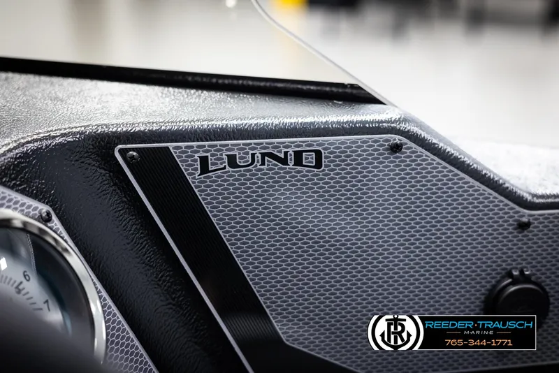 Slide: The Image of Dashboard of 2025 Lund 1650 Rebel XL SS boat with logo detail. - 22