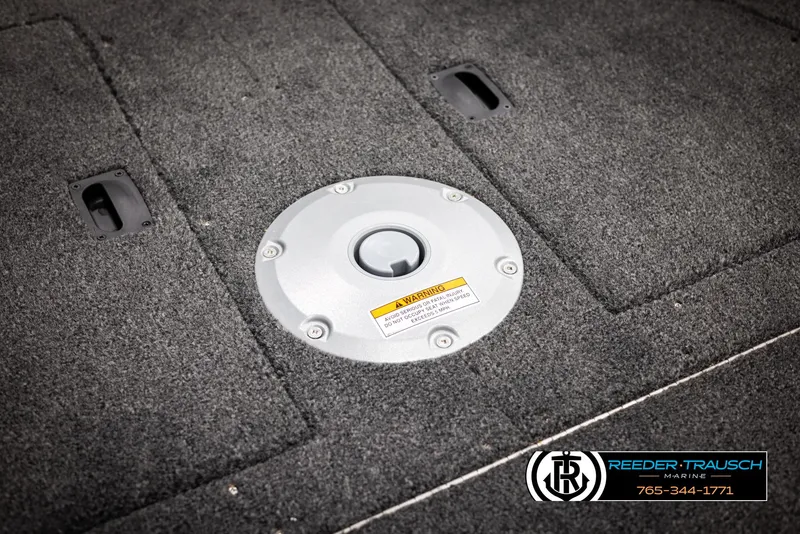 Slide: The Image of 2025 Lund 1650 Rebel XL SS boat deck with storage compartments. - 26