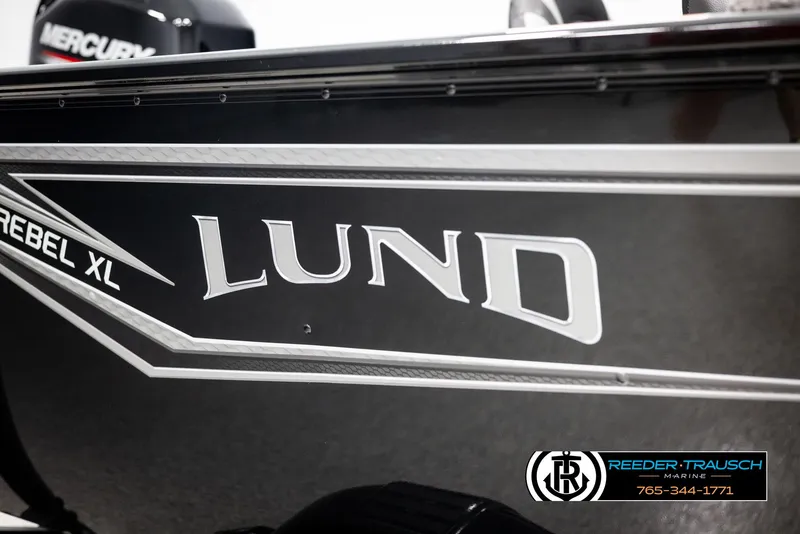 Slide: The Image of 2025 Lund 1650 Rebel XL SS boat branding with Reeder-Trausch Marine logo. - 32