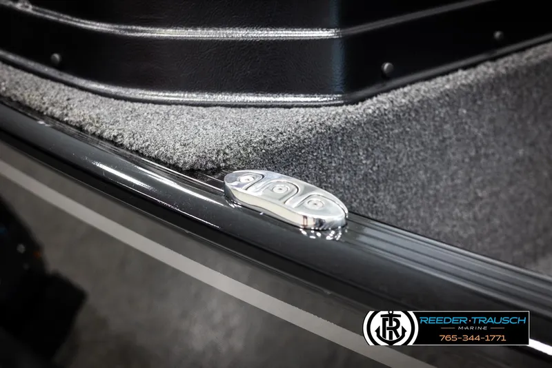 Slide: The Image of 2025 Lund 1650 Rebel XL SS boat interior with control panel detail. - 39