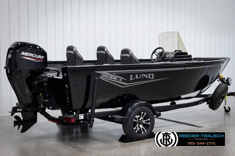 Slide: The Image of 2025 Lund 1650 Rebel XL SS boat with Mercury engine on trailer. - 4