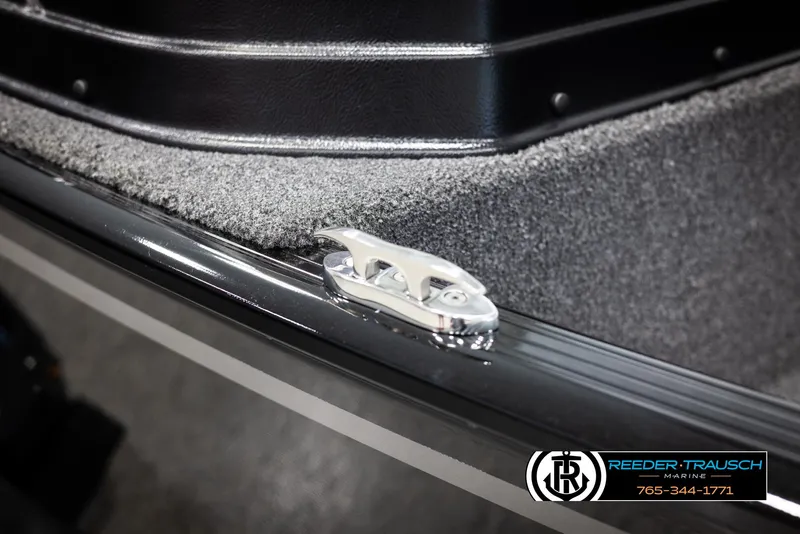 Slide: The Image of 2025 Lund 1650 Rebel XL SS boat cleat detail, Reeder-Trausch branding visible. - 40