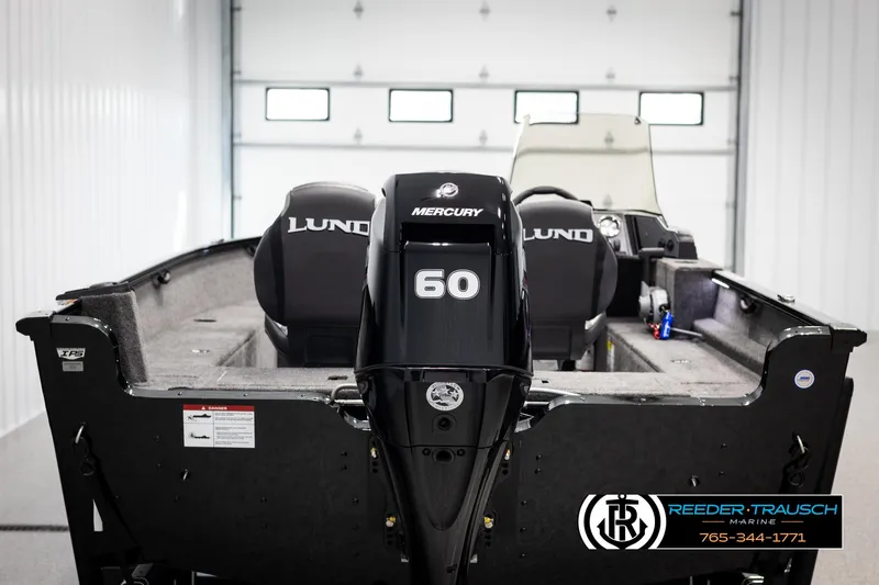Slide: The Image of 2025 Lund 1650 Rebel XL SS boat with Mercury 60 engine in garage. - 5