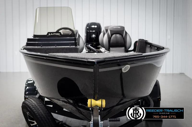 Slide: The Image of 2025 Lund 1650 Rebel XL SS boat on trailer in showroom. - 6