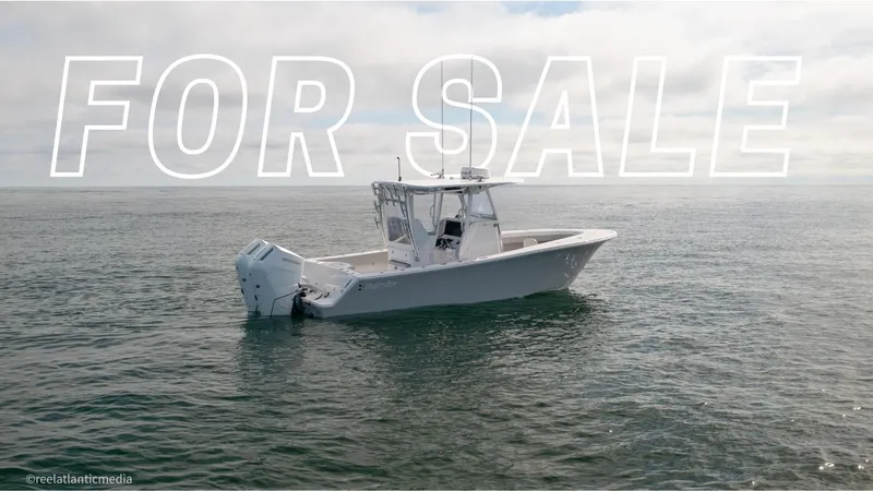 Slide: The Image of 2024 Onslow Bay 27XS boat for sale on open water. - 0