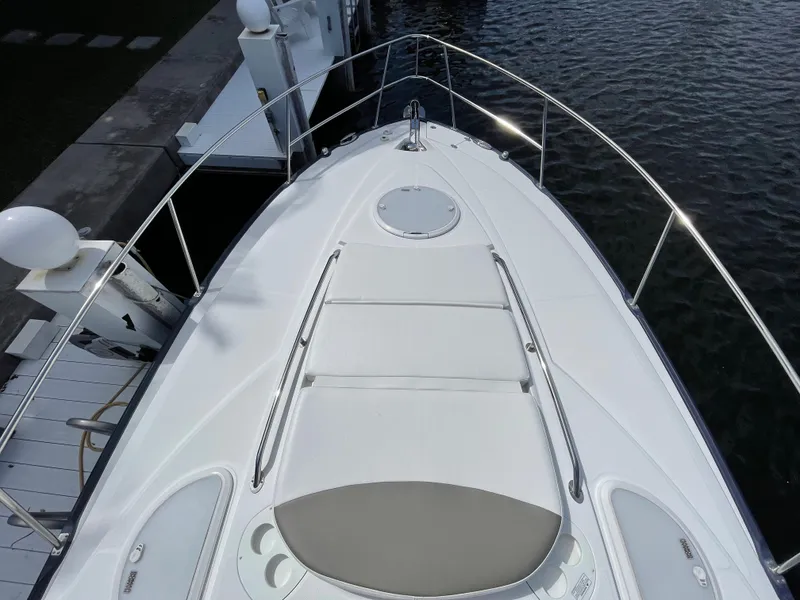 Slide: The Image of 2016 Monterey 335 Sport Yacht bow view at dock. - 11