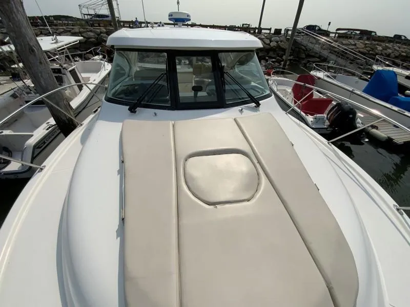 Slide: The Image of 2013 Tiara Yachts 36 boat docked at marina, front deck view. - 30