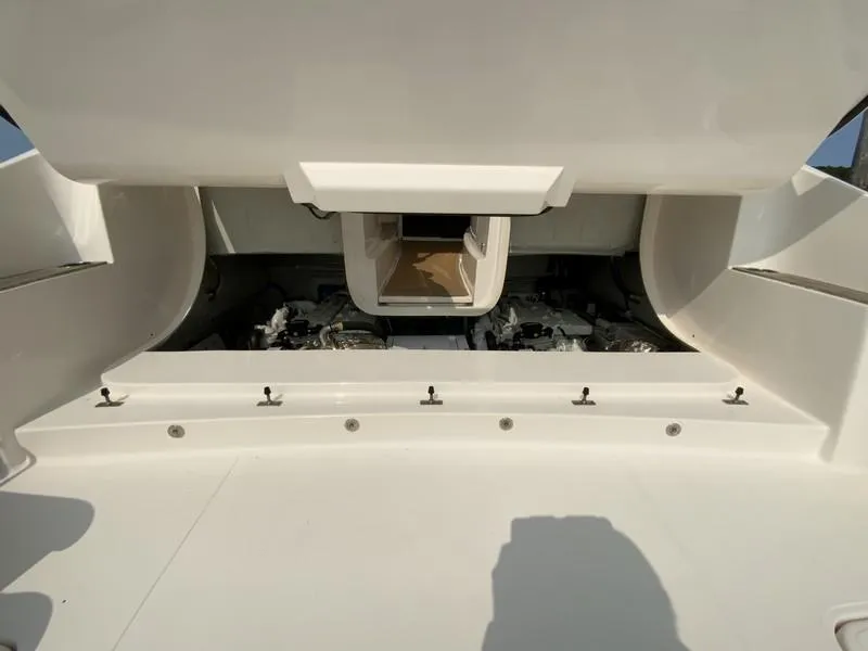 Slide: The Image of Engine compartment of 2013 Tiara Yachts 36, showcasing mechanical components and design. - 33
