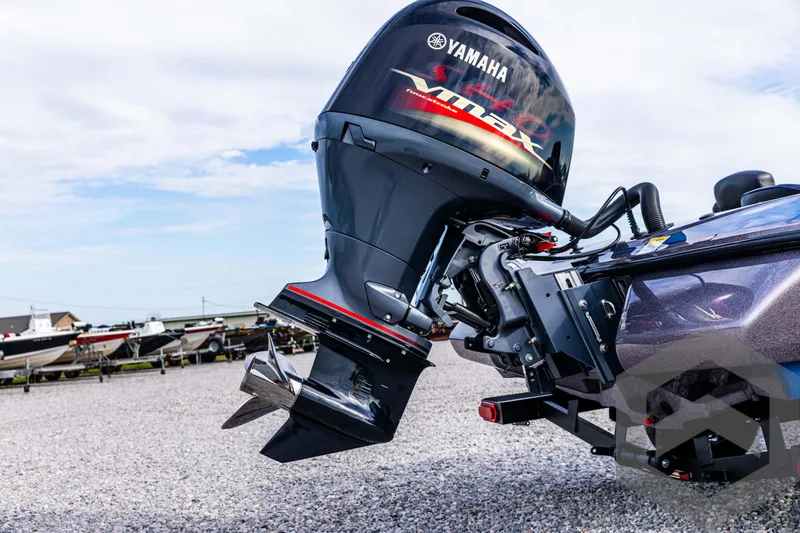 Slide: The Image of Skeeter ZX 150 boat with Yamaha VMAX engine, 2025 model, parked on gravel. - 15