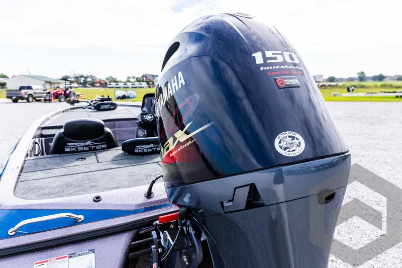 Slide: The Image of 2025 Skeeter ZX 150 boat with Yamaha 150 engine in outdoor setting. - 18