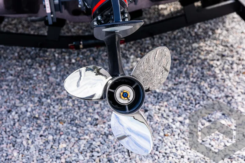 Slide: The Image of 2025 Skeeter ZX 150 boat propeller on gravel surface. - 19