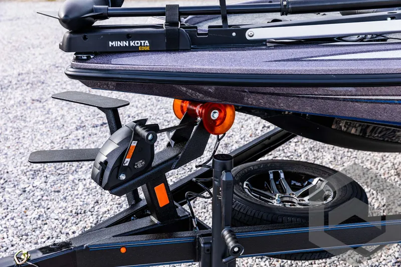 Slide: The Image of 2025 Skeeter ZX 150 boat with Minn Kota Edge trolling motor on trailer. - 29