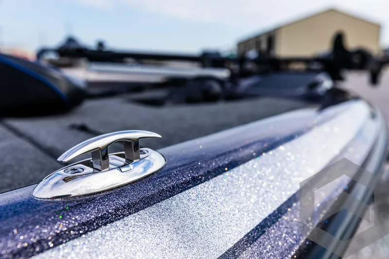 Slide: The Image of 2025 Skeeter ZX 150 boat detail with metallic finish and cleat. - 37