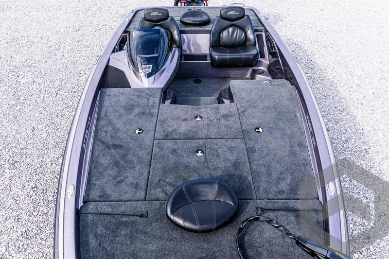 Slide: The Image of 2025 Skeeter ZX 150 boat interior with plush seating and spacious deck. - 38