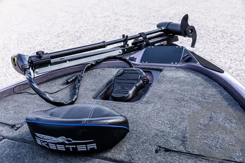 Slide: The Image of 2025 Skeeter ZX 150 boat deck with trolling motor and control panel. - 41