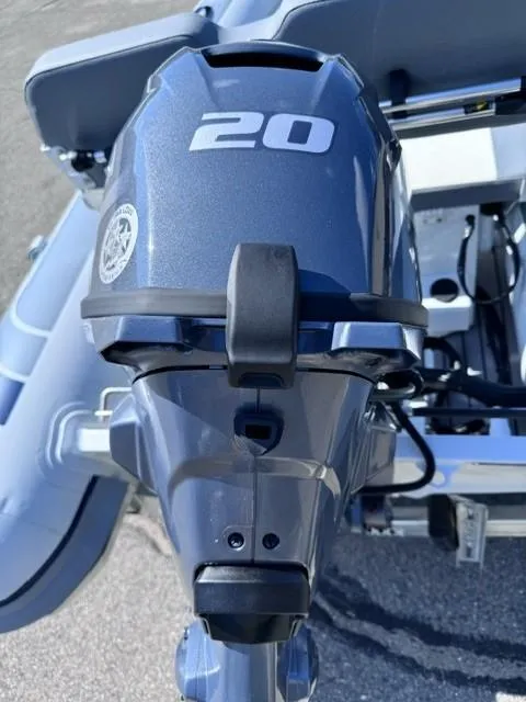 Slide: The Image of 2024 Highfield Classic 310 FCT boat with 20 HP outboard motor. - 3