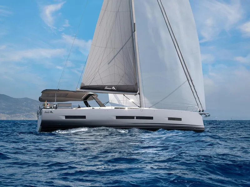 Slide: The Image of 2025 Hanse 590 yacht sailing on open sea under clear blue sky. - 13