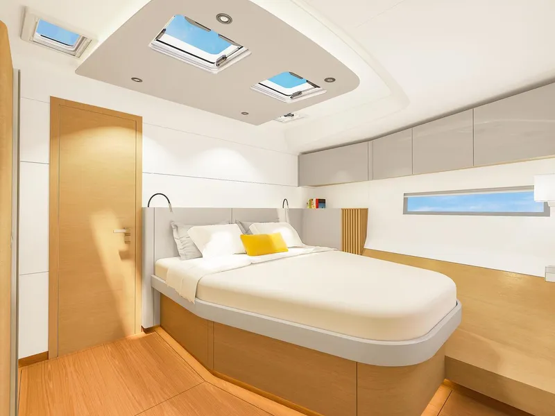 Slide: The Image of Luxurious 2025 Hanse 590 yacht cabin with modern design and skylights. - 28
