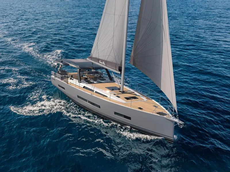 Slide: The Image of 2025 Hanse 590 yacht sailing on open blue sea. - 14