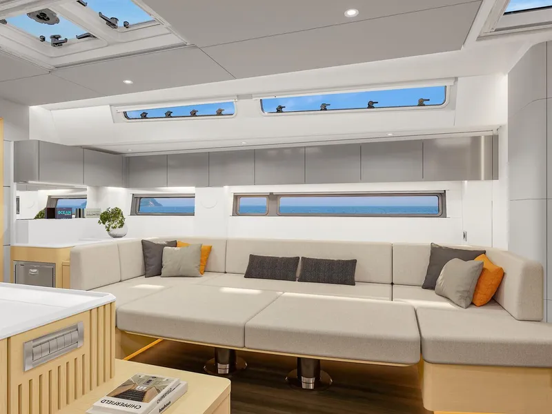 Slide: The Image of Luxurious interior of 2025 Hanse 590 yacht with modern seating and panoramic windows. - 40