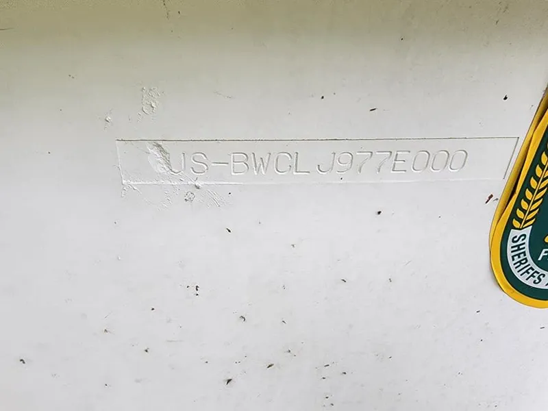 Slide: The Image of Hull identification number on 2000 Boston Whaler Sport 13 boat. - 13