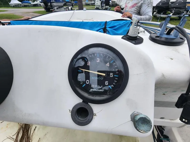 Slide: The Image of Close-up of 2000 Boston Whaler Sport 13 boat dashboard with RPM gauge. - 8