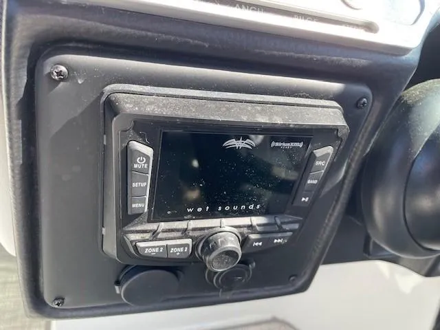 Slide: The Image of Wet Sounds audio system in 2023 Crownline 290 XSS boat dashboard. - 21