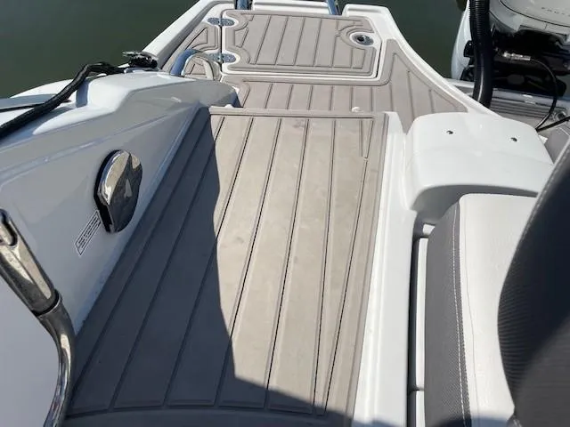 Slide: The Image of 2023 Crownline 290 XSS boat deck with sleek design and modern features. - 23