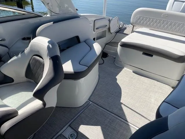 Slide: The Image of 2023 Crownline 290 XSS boat interior with modern seating and elegant design. - 28