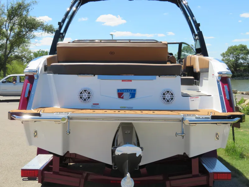 Slide: The Image of 2024 Cobalt R4 boat rear view with swim platform and speakers. - 1