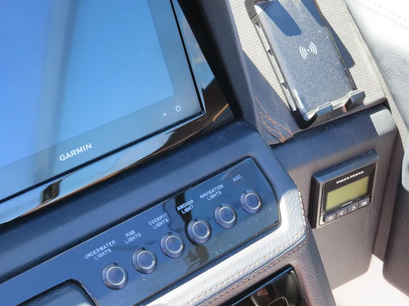 Slide: The Image of 2024 Cobalt R4 dashboard with Garmin display and control buttons. - 16