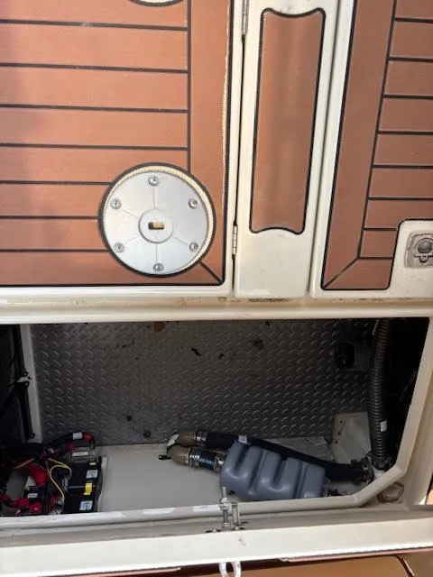 Slide: The Image of 2023 Ranger Tugs R-29 S engine compartment with visible components and wiring. - 24