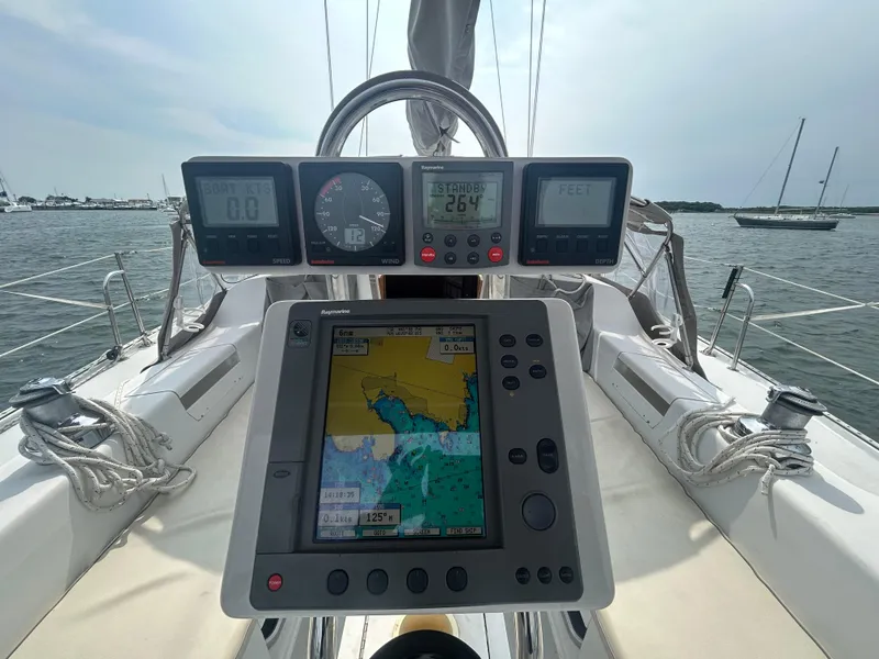 Slide: The Image of Cockpit of 1998 Catalina 42 MkII sailboat with navigation instruments and GPS display. - 8
