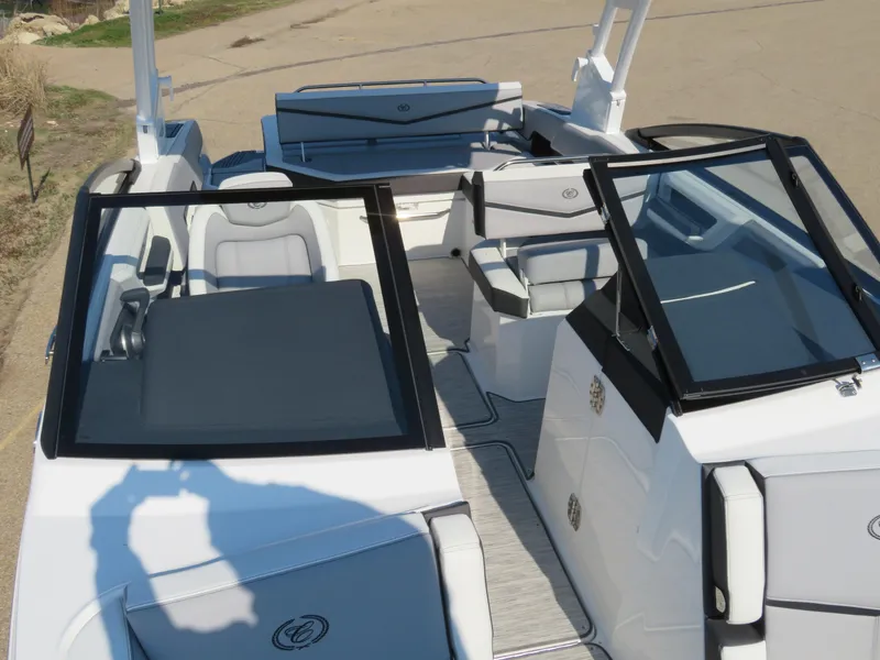 Slide: The Image of 2024 Cobalt R6 Surf boat interior with sleek seating and modern design. - 17