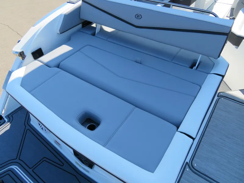 Slide: The Image of 2024 Cobalt R6 Surf boat with sleek gray seating and modern design. - 22