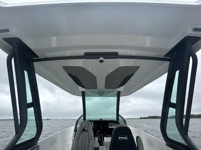 Slide: The Image of 2025 Monterey 27 Elite boat interior with modern design and spacious seating. - 8