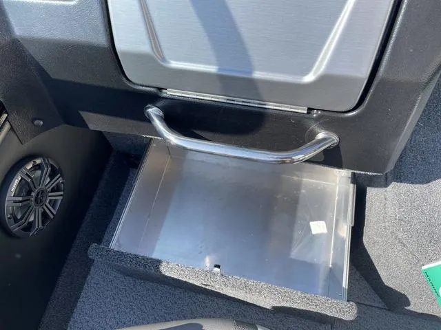 Slide: The Image of Open storage compartment in 2025 Lund 2075 Pro-V Sport boat interior. - 20