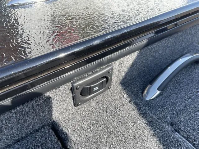 Slide: The Image of 2025 Lund 2075 Pro-V Sport boat interior detail with textured surface and handle. - 34