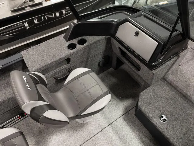 Slide: The Image of 2025 Lund 1875 Impact XS boat interior with gray seating and console. - 11