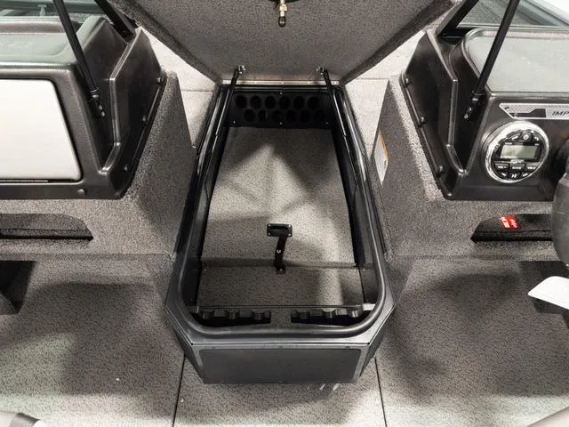 Slide: The Image of 2025 Lund 1875 Impact XS boat interior storage compartment, open and empty. - 15