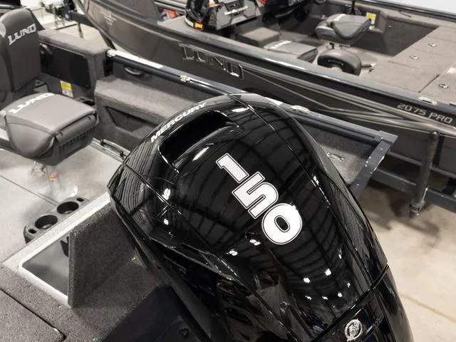 Slide: The Image of 2025 Lund 1875 Impact XS boat with Mercury 150 engine, interior view. - 19