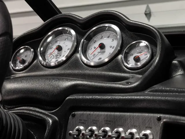 Slide: The Image of Dashboard of 2025 Lund 2075 Fisherman Sport boat with gauges and controls. - 16