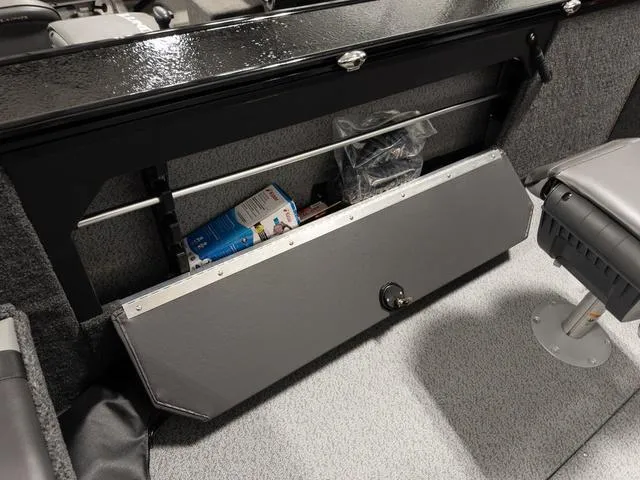 Slide: The Image of Storage compartment in 2025 Lund 2075 Fisherman Sport boat interior. - 7