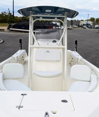 Slide: The Image of 2025 Cobia 220 CC boat at Buckeye Sports Center, showcasing powerful engine. - 10