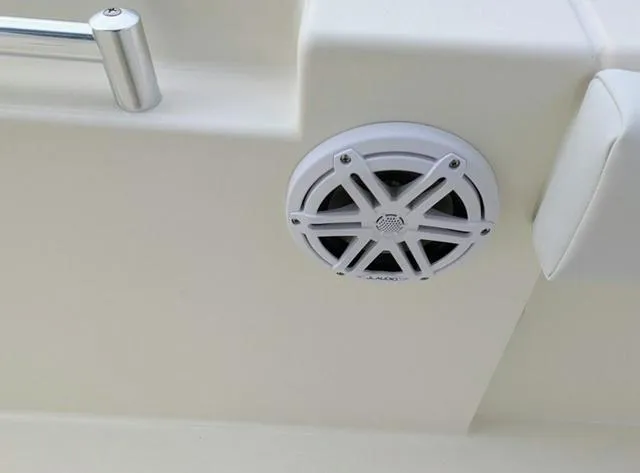 Slide: The Image of Open storage compartment on 2025 Cobia 220 CC boat. - 25